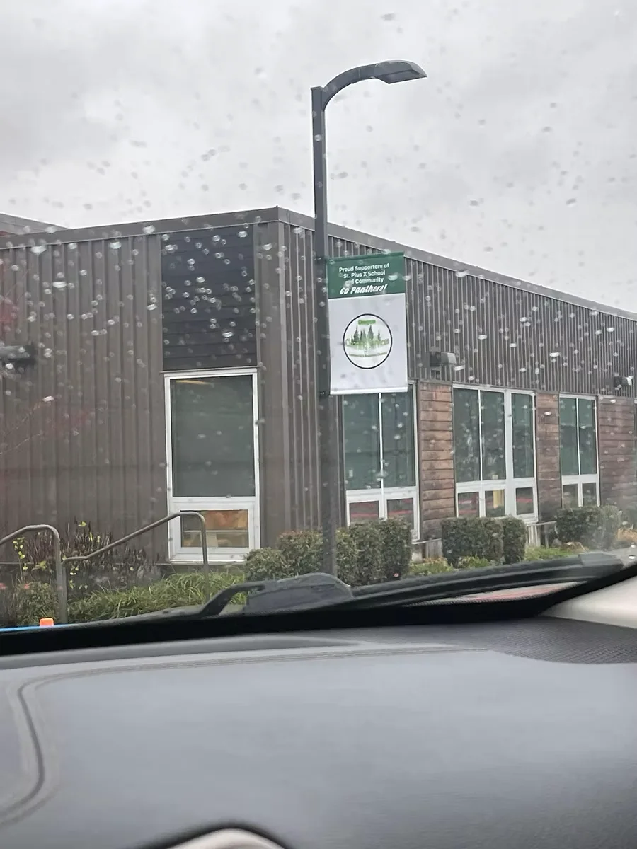 Community school displaying an Oregon Cleaning Services supporter banner