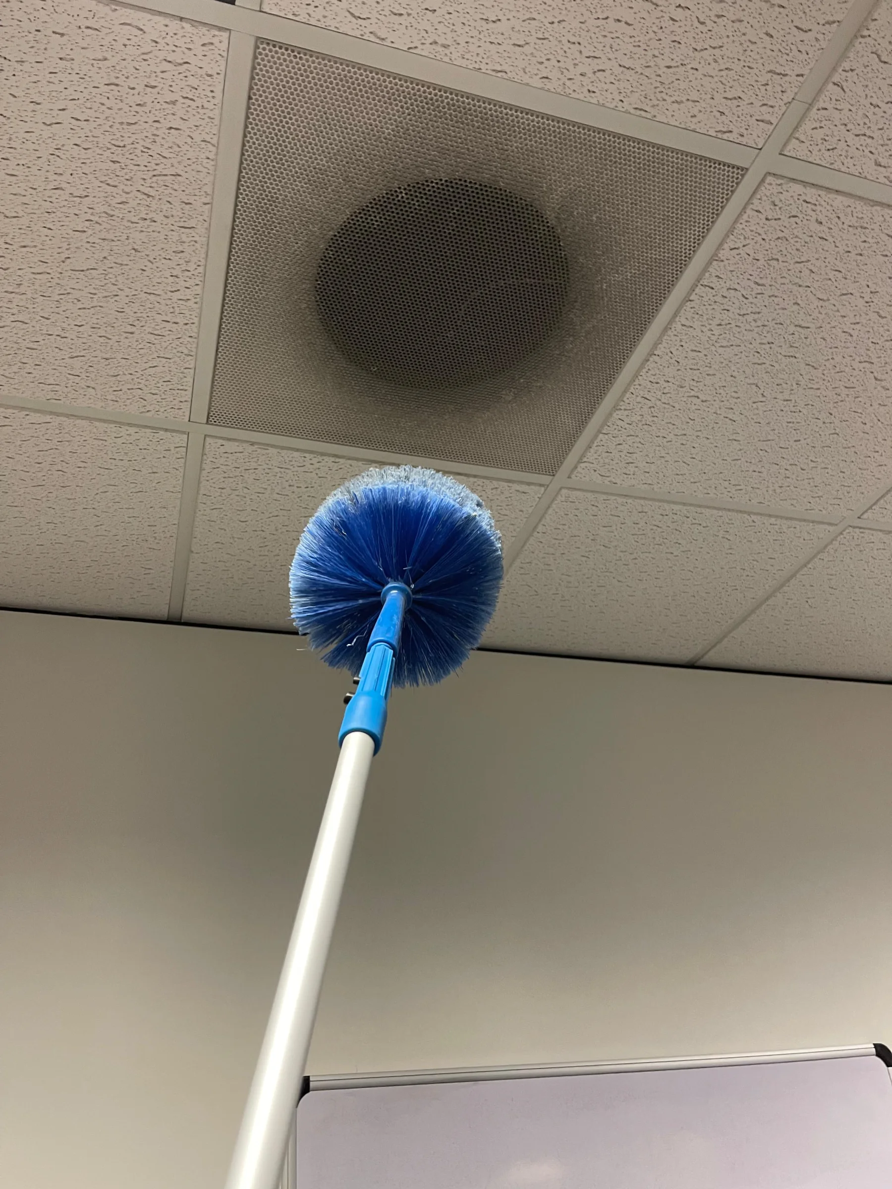 Professional duct dusting service removing dust and allergens to improve air quality and create a healthier environment